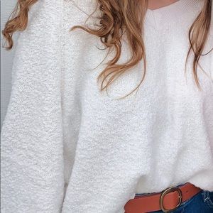 fuzzy white sweater